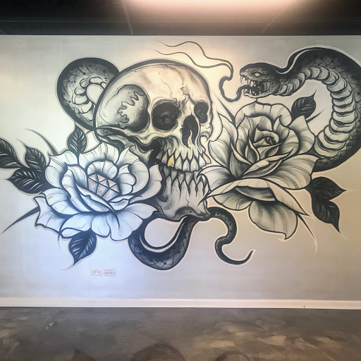 Explore dark skin male black skin tattoo ideas, creative tattoo ideas in Lake Bluff, available at Evolution Body Arts