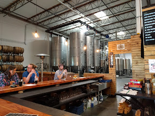 Friends sharing beers at a table