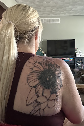 Explore american traditional chest tattoo ideas, creative tattoo ideas in East Lansing, available at Splash of Color Tattoo & Piercing Studio