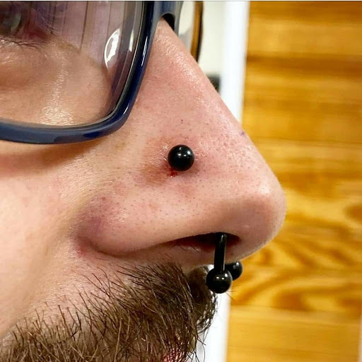 Explore tattoo ideas for hips, creative tattoo ideas in Charleston, available at Exotic Impressions Body Piercing