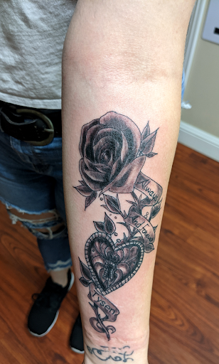 Explore small jesus tattoo ideas, creative tattoo ideas in Pittsburg, available at NeonMoon Tattoo