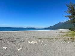 Foto van Manbo Beach met hoog niveau van netheid