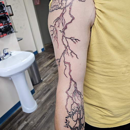 Explore november birth flower tattoo ideas, creative tattoo ideas in Traverse City, available at Pinups & Needles