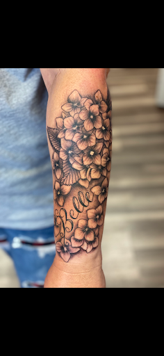 Explore grandson tattoo ideas for grandma, creative tattoo ideas in Saint Marys, available at Empire Tattoo