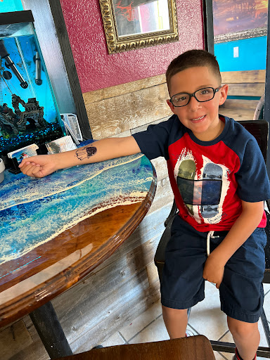 Explore animal tattoo ideas for guys, creative tattoo ideas in Port Aransas, available at SHARK ATTACK TATTOO