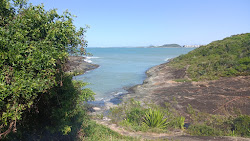 Prainha do Morro do Cruzeiro'in fotoğrafı dağlarla çevrili