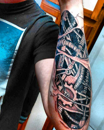 Explore haiti tattoo ideas, creative tattoo ideas in Hudson Falls, available at ALTERED ADDICTION TATTOOS