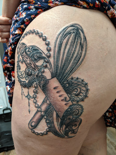 Explore ripped skin tattoo ideas, creative tattoo ideas in Tewksbury, available at Lucid Arts Tattoo Studio