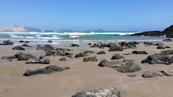Te Werahi Beach'in fotoğrafı dağlarla çevrili