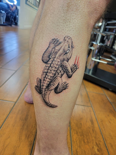Explore ambition tattoo ideas, creative tattoo ideas in Stuart, available at Tiger Shark Tattoo Studio