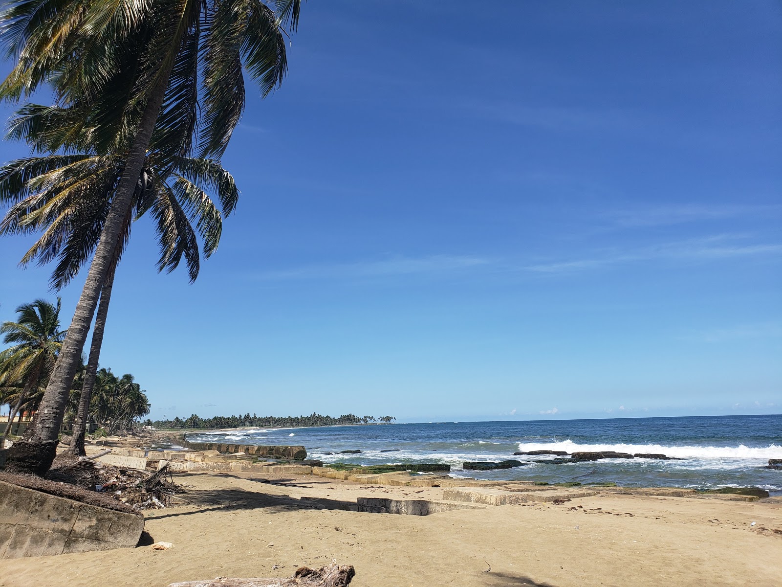 Foto de Playa La posita con arena brillante superficie