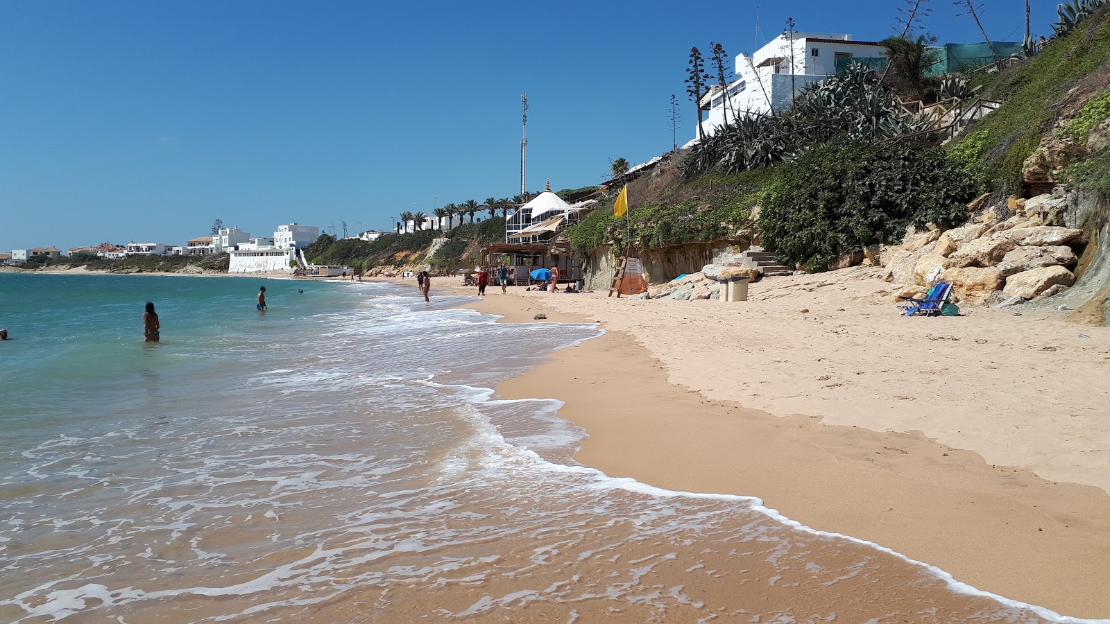 Foto von Playa de Guadalupe mit feiner beiger sand Oberfläche