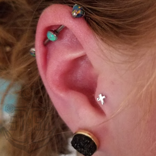 Explore mens rib tattoo ideas, creative tattoo ideas in Kearney, available at Studio 5150 Piercing & Fine Jewelry