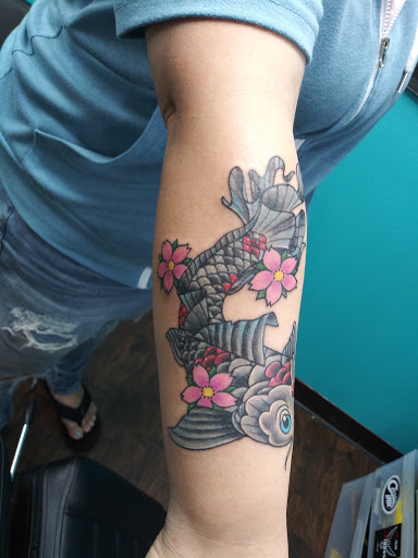 Explore mens neck tattoos ideas, creative tattoo ideas in Pinellas Park, available at Lollis Studios Tattoo Company