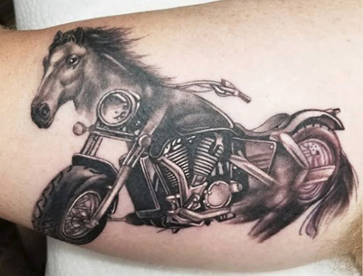 Find goth tattoo ideas for men for your next unique tattoo in Baldwin at Salvation Tattoo