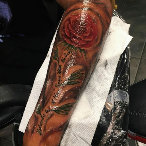 Explore sun tattoo ideas, creative tattoo ideas in Las Vegas, available at Work of Art Tattoo and Piercing