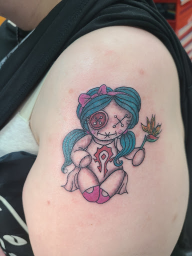 Explore red string of fate tattoo ideas, creative tattoo ideas in New Orleans, available at Mid City Voodoux Tattoos