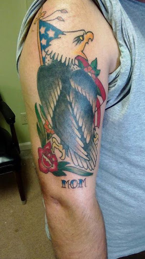 Explore tattoo ideas for mens leg, creative tattoo ideas in Benton, available at Relics Tattoo Studio