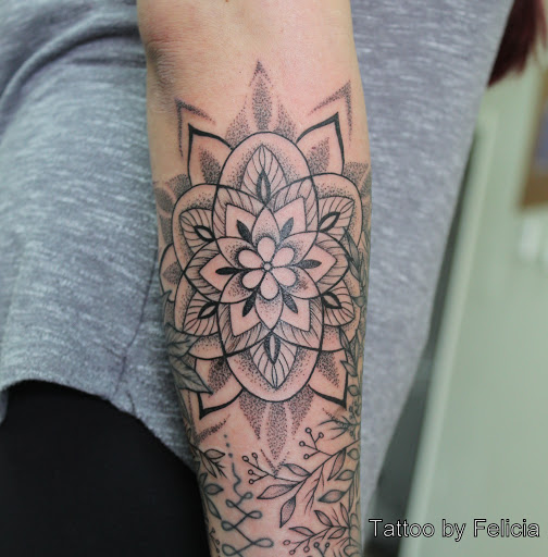 Explore tattoo on thigh ideas, creative tattoo ideas in Fort Myers, available at Tiger Lotus Tattoo and Piercing