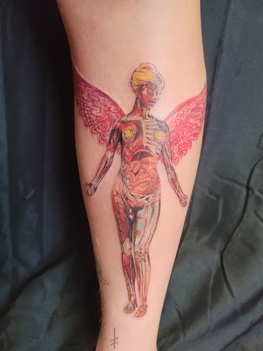 Explore collarbone tattoo ideas for guys, creative tattoo ideas in Anniston, available at Lucid Dreams Tattoos and Piercings