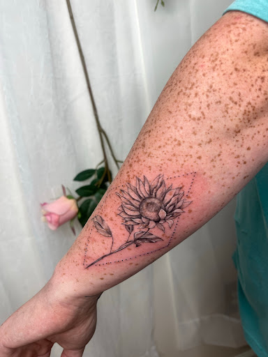 Explore flower tattoo ideas for guys, creative tattoo ideas in Foley, available at Emerald Ink Tattoos by Victoria
