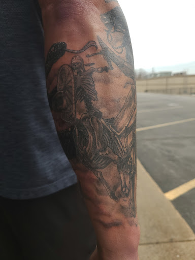 Explore f1 tattoo ideas, creative tattoo ideas in Omaha, available at LeVeL UP Tattoo