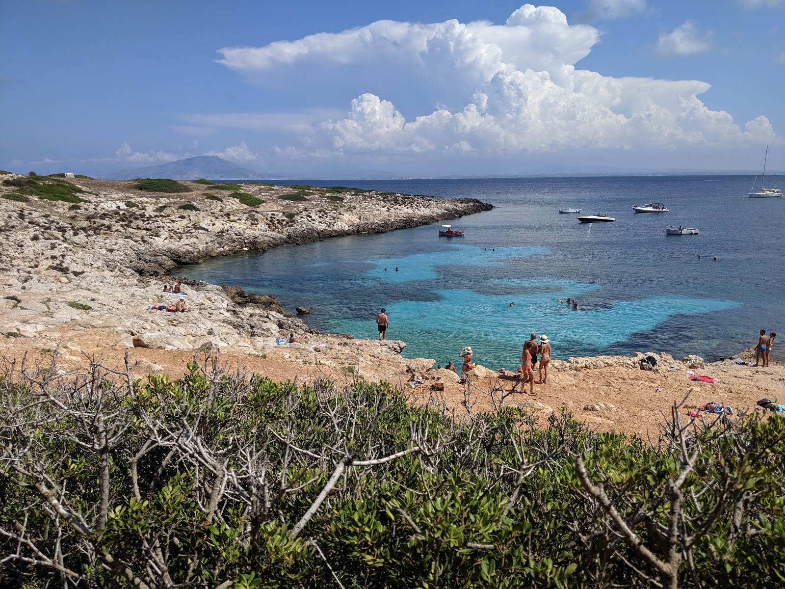 Photo of Cala Minnola beach with turquoise pure water surface