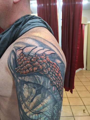 Explore lip tattoo ideas for guys, creative tattoo ideas in Radcliff, available at Baldys Tattoo & Piercing Parlor