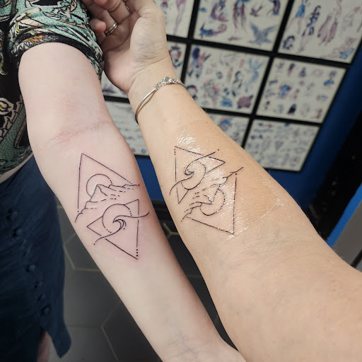 Explore purple rose tattoo ideas, creative tattoo ideas in Cincinnati, available at Beelistic Tattoo and Piercing