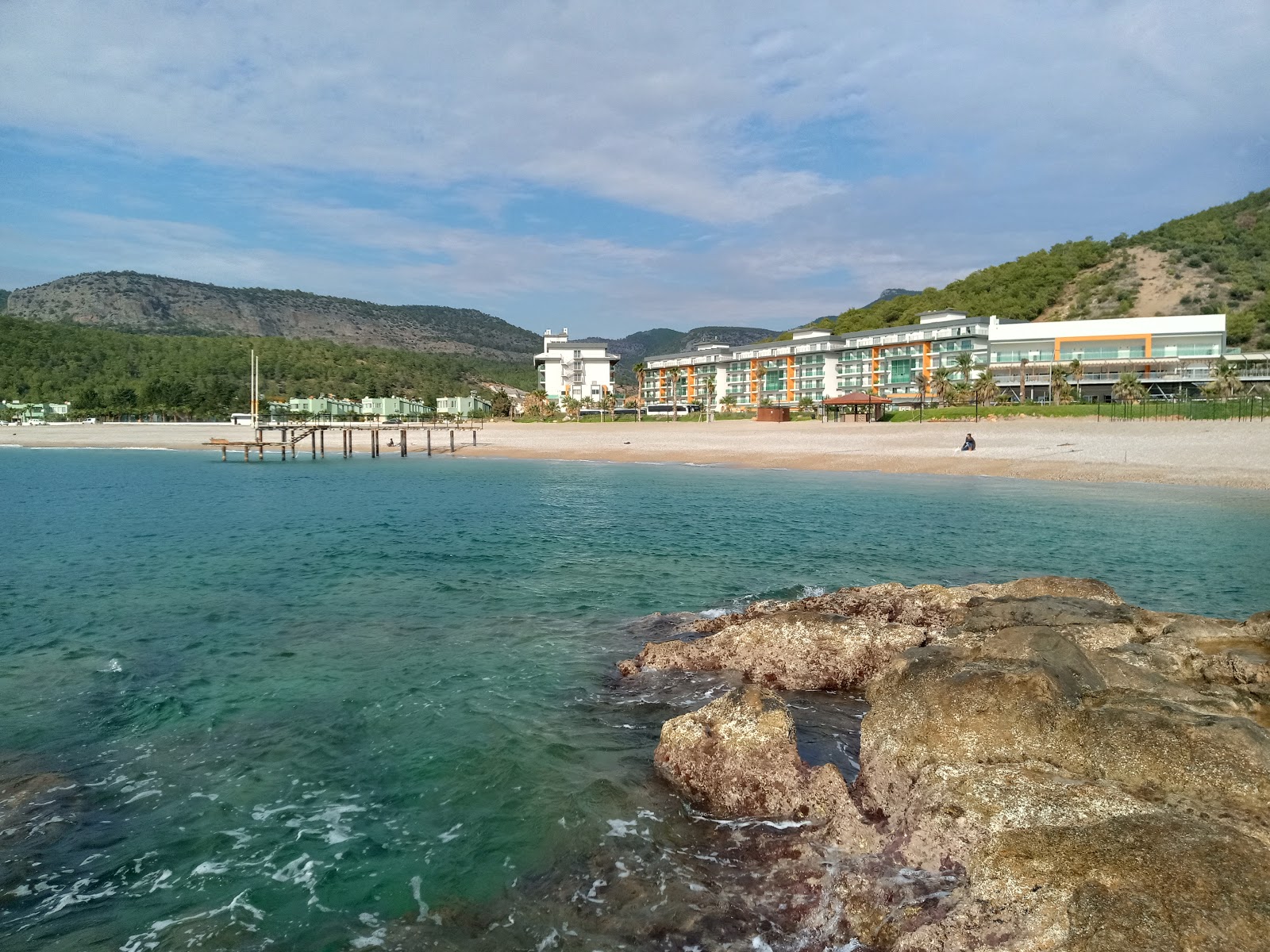 Foto van Ulu beach met turquoise water oppervlakte