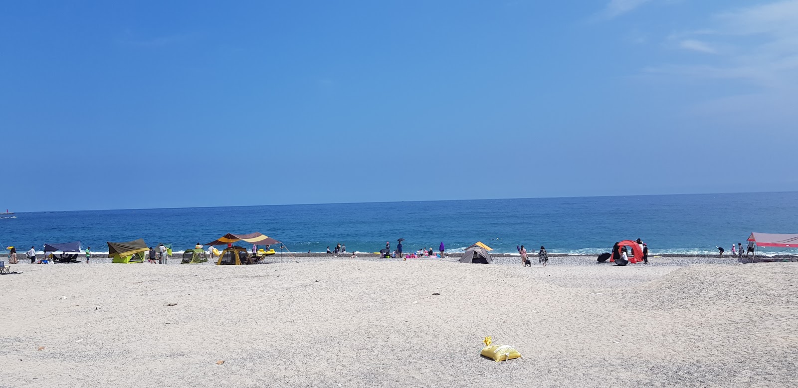 Zdjęcie Oryu Beach z poziomem czystości wysoki