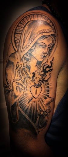 Explore lamb of god tattoo ideas, creative tattoo ideas in Rogers, available at Ink Solutions Tattoo