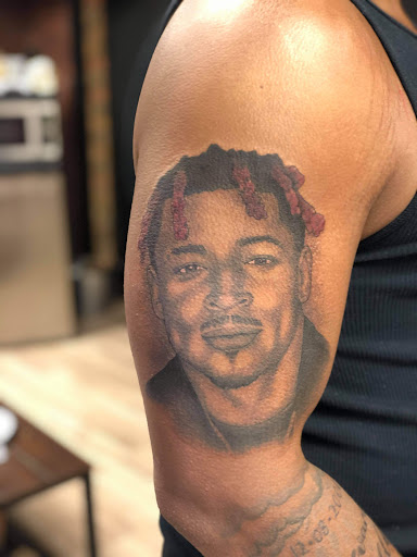 Explore bow tattoo ideas, creative tattoo ideas in Troy, available at All In Tattoo Co.