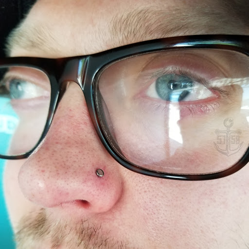 Explore fisherman tattoo ideas, creative tattoo ideas in Kearney, available at Studio 5150 Piercing & Fine Jewelry