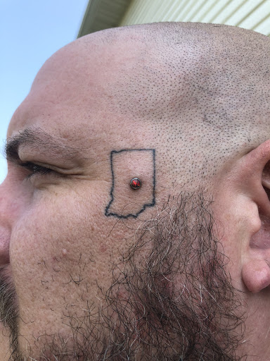 Explore thigh cover up tattoo ideas, creative tattoo ideas in Bloomington, available at Evil by the Needle Custom Tattoo and Piercing Studio