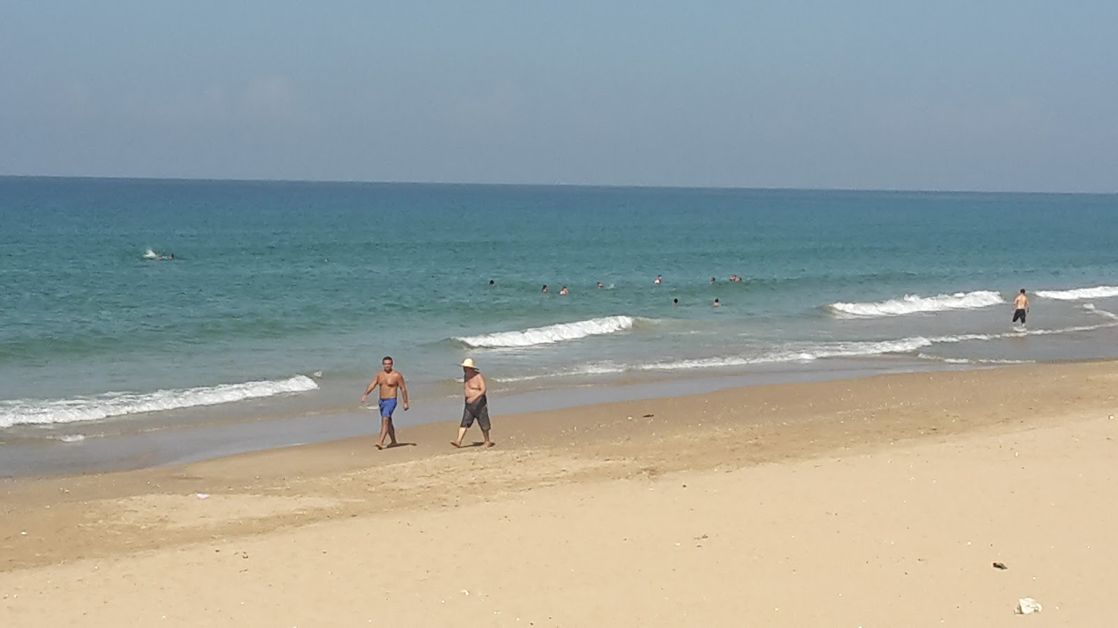 Foto van Saida Beach met turquoise water oppervlakte