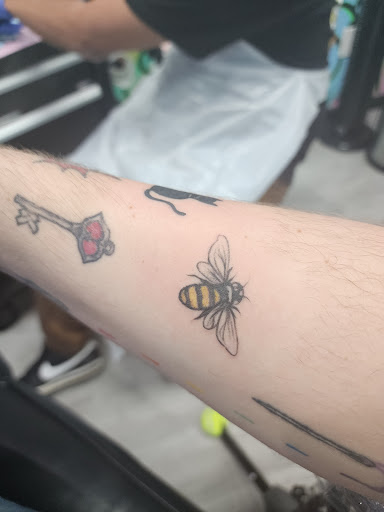 Explore hand tattoo ideas for men, creative tattoo ideas in Laughlin, available at Freshwater Tattoo