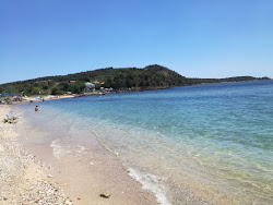 Photo de Astrida beach entouré de montagnes