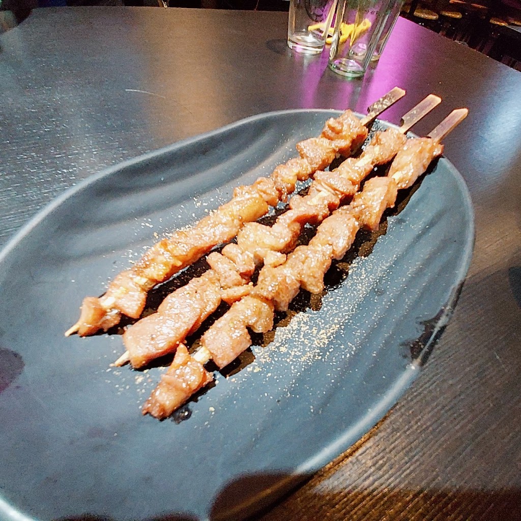 賣烤魚的。 的照片