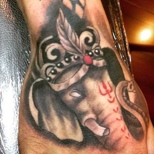 Tattoo Shop «Ink & Iron Custom Tattoo Studio», reviews and photos, 3700 N Cicero Ave, Chicago, IL 60641, USA