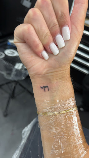 Explore cool small tattoo ideas for guys, creative tattoo ideas in Hollywood, available at Sacred Eye Tattoos