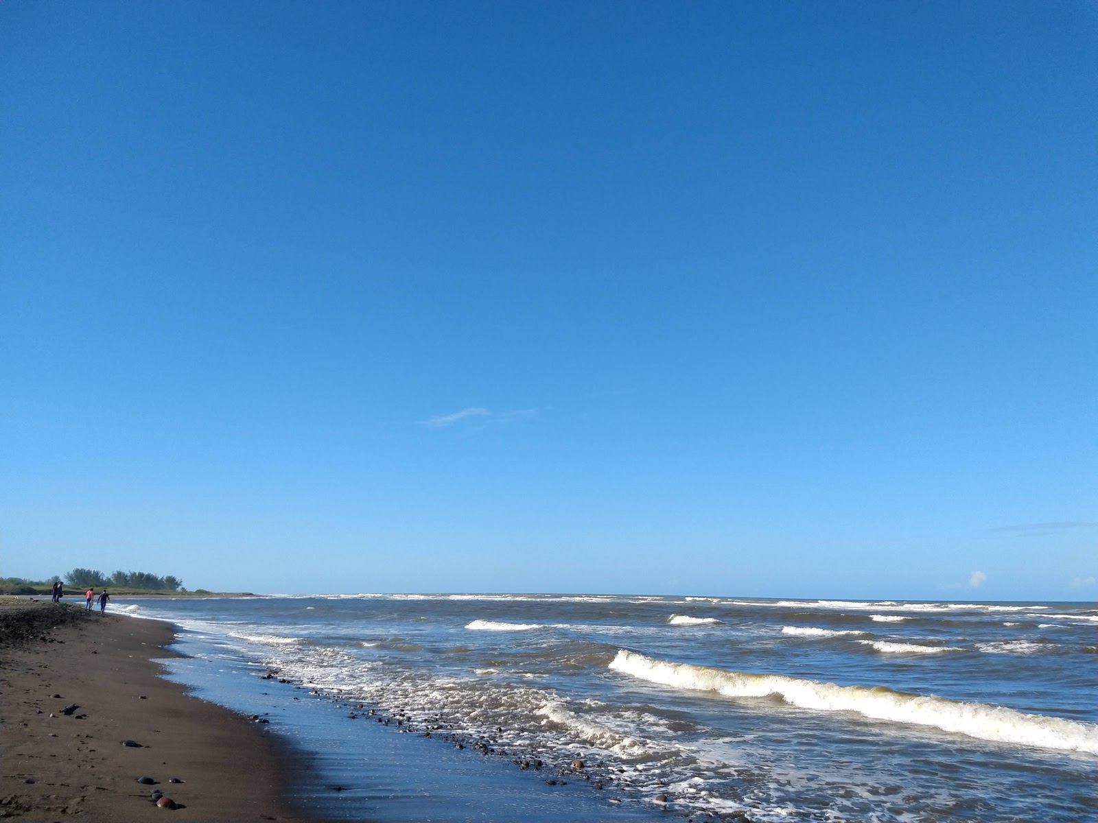 Foto di Playa El Raudal con una superficie del acqua turchese