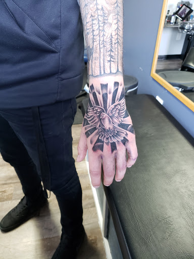 Tattoo Shop «Next Level Tattoo Company - Imlay City», reviews and photos, 420 E 3rd St, Imlay City, MI 48444, USA