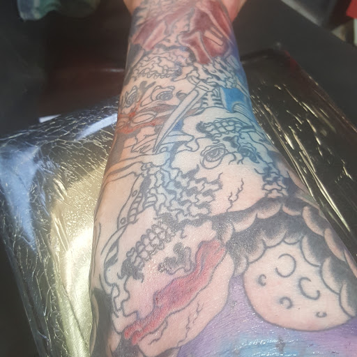 Tattoo Shop «Sacred Ink Tattoo», reviews and photos, 2707 E Court St, Flint, MI 48503, USA