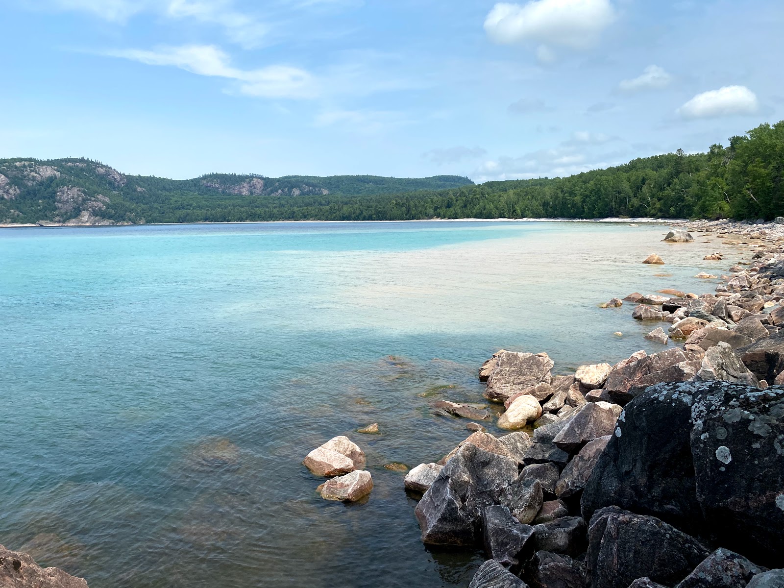 Foto van Alona Bay met ruim strand