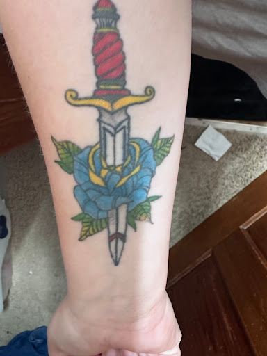 Explore gunslinger tattoo ideas, creative tattoo ideas in Burlington, available at Destination Ink