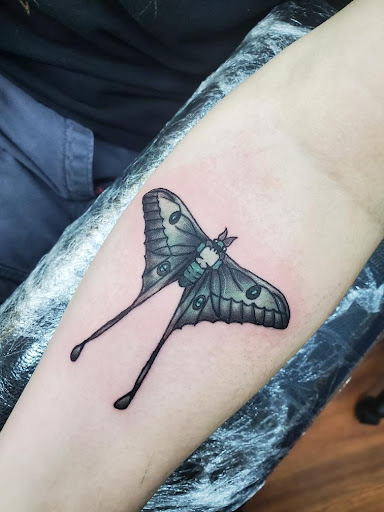 Explore half sleeve forearm tattoo ideas, creative tattoo ideas in Cocoa, available at Rorschach Tattoo Shop and Piercing Studio