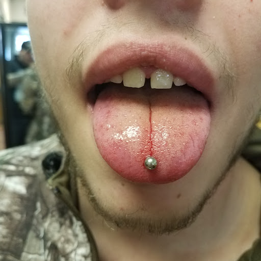 Explore semicolon tattoo ideas for guys, creative tattoo ideas in Hudson Falls, available at ALTERED ADDICTION TATTOOS