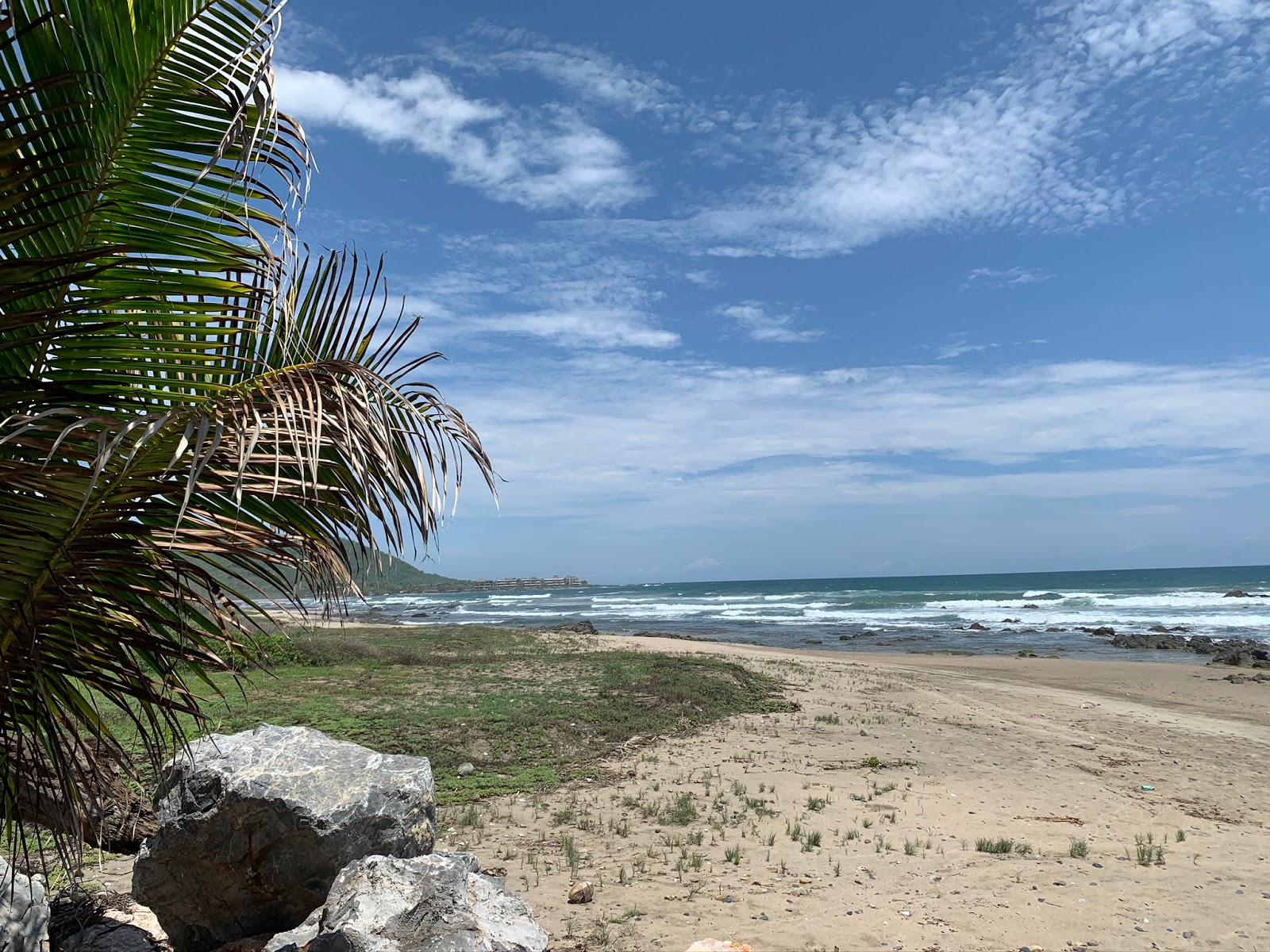 Foto van Playa Majahua met turquoise puur water oppervlakte