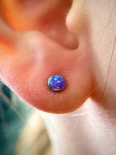 Explore great tattoo ideas for women, creative tattoo ideas in Orange, available at Symbiosis Body Piercing